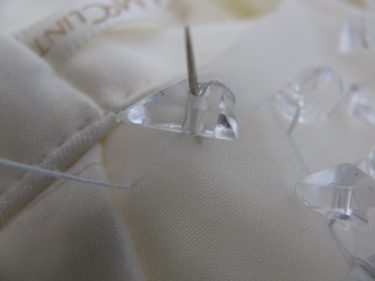 needle coming up through clear bead, wedding dress, 698
