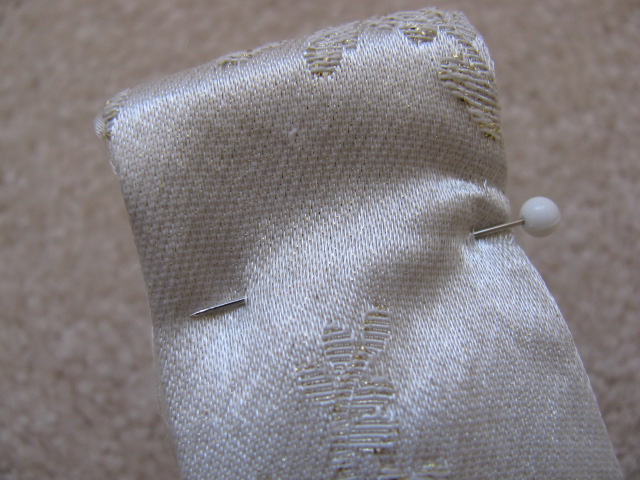 Tutorial: Use a simple tuck to shorten straps – Sewing