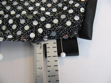 measuring the placement of the ribbons for corset back #2