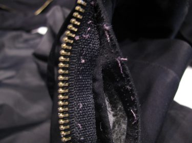 zipper almost out of jacket, 1408
