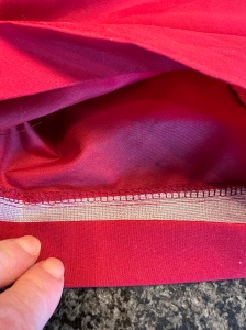 9699, folded hem up with interfacing showing, how to fix a ripped hem